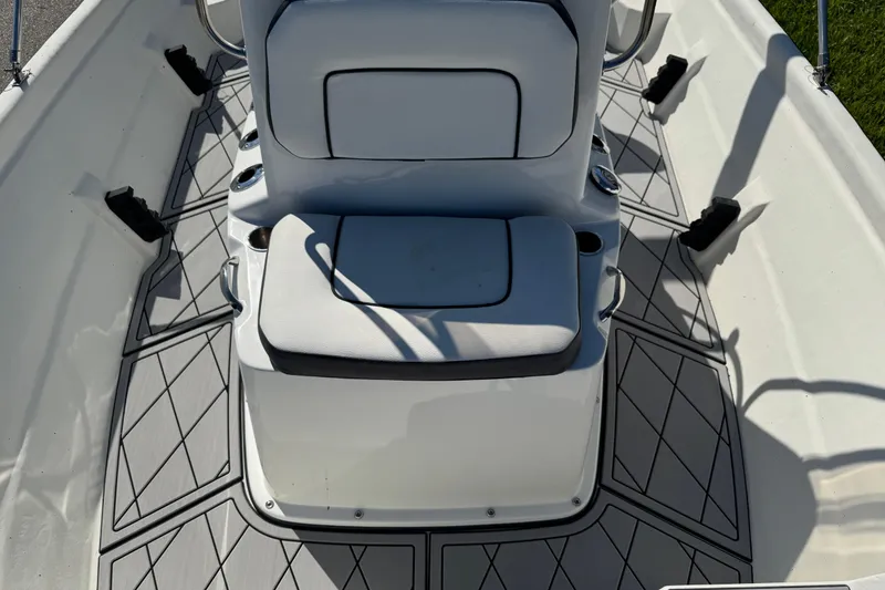 Slide: The Image of Interior of 2019 Cape Craft 180 boat with cushioned seating and patterned flooring. - 19