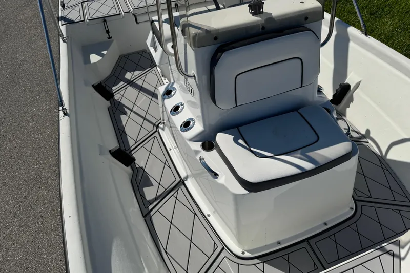 Slide: The Image of 2019 Cape Craft 180 boat interior with cushioned seating and non-slip flooring. - 20
