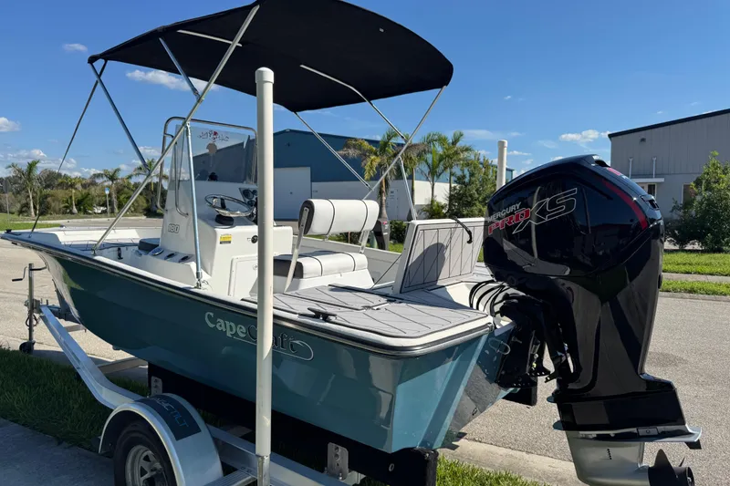 Slide: The Image of 2019 Cape Craft 180 boat with Mercury Pro XS engine on trailer, outdoor setting. - 32