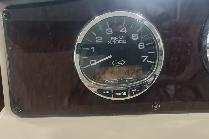 Slide: The Image of Tachometer of 2011 Sea Ray 330 Sundancer displaying RPM and engine hours. - 14