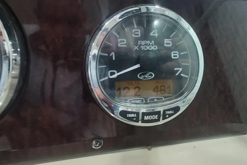 Slide: The Image of Close-up of 2011 Sea Ray 330 Sundancer tachometer displaying RPM and voltage. - 15