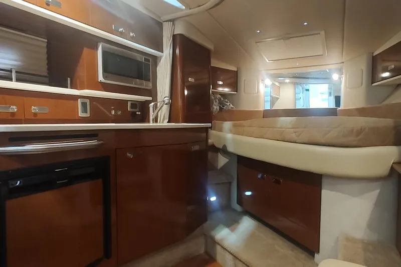 Slide: The Image of Luxurious interior of 2011 Sea Ray 330 Sundancer yacht with modern amenities. - 19