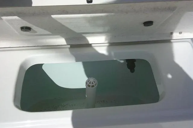 Slide: The Image of Open livewell in 2018 KenCraft 2060 BAYRIDER boat, showing interior water compartment. - 14