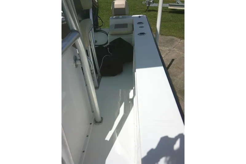 Slide: The Image of 2018 KenCraft 2060 BAYRIDER boat interior with seating and storage compartments. - 15