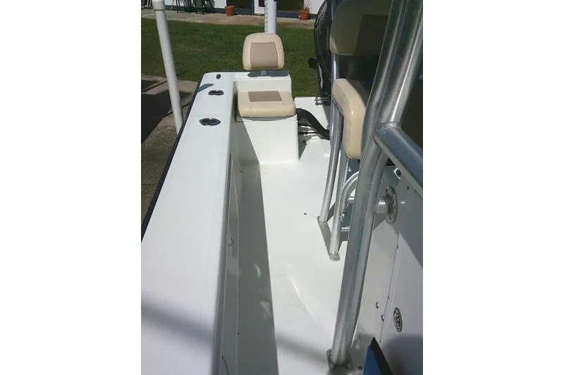Slide: The Image of 2018 KenCraft 2060 BAYRIDER boat interior with seating and railing. - 16