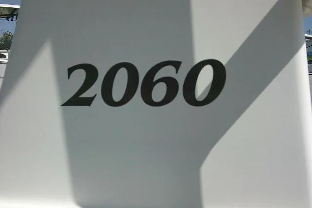Slide: The Image of KenCraft 2060 BAYRIDER 2018 model number on boat hull in sunlight. - 18