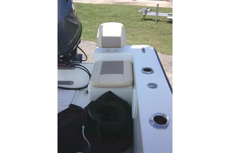 Slide: The Image of 2018 KenCraft 2060 BAYRIDER boat interior with seating and rod holders. - 22