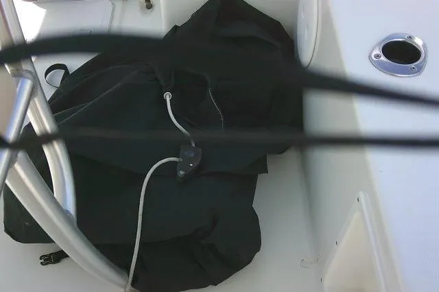 Slide: The Image of 2018 KenCraft 2060 BAYRIDER boat interior with black cover and metal railing. - 24