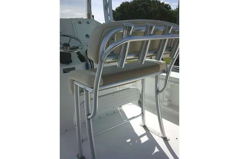 Slide: The Image of 2018 KenCraft 2060 BAYRIDER boat interior with cushioned seating and rod holders. - 25