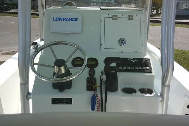 Slide: The Image of 2018 KenCraft 2060 BAYRIDER boat console with steering wheel and Lowrance equipment. - 27