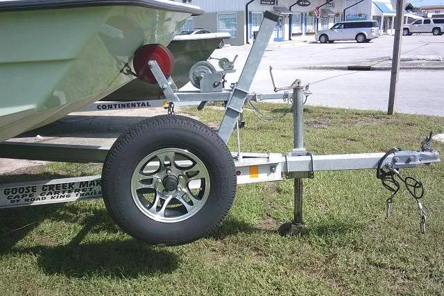 Slide: The Image of 2018 KenCraft 2060 BAYRIDER boat on trailer, parked on grass. - 3