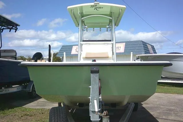 Slide: The Image of 2018 KenCraft 2060 BAYRIDER boat on trailer, green hull, outdoor display. - 5