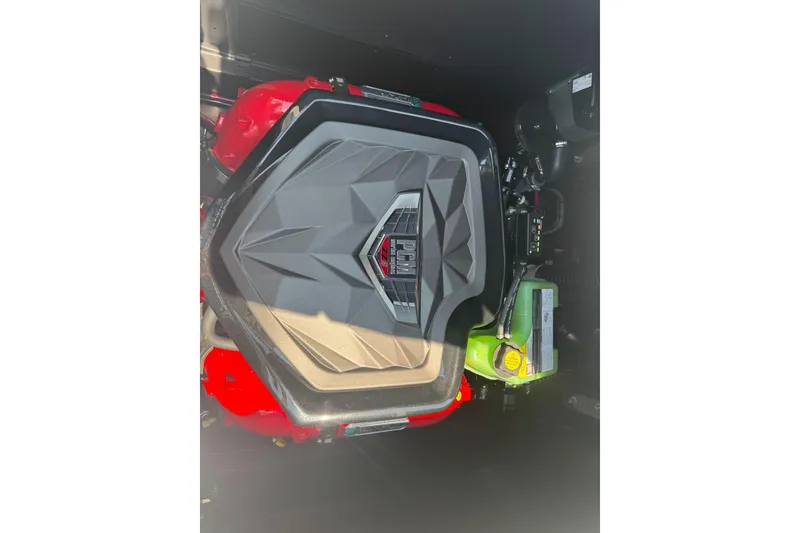 Slide: The Image of 2025 Nautique Super Air Nautique G23 engine compartment with PCM engine cover. - 5