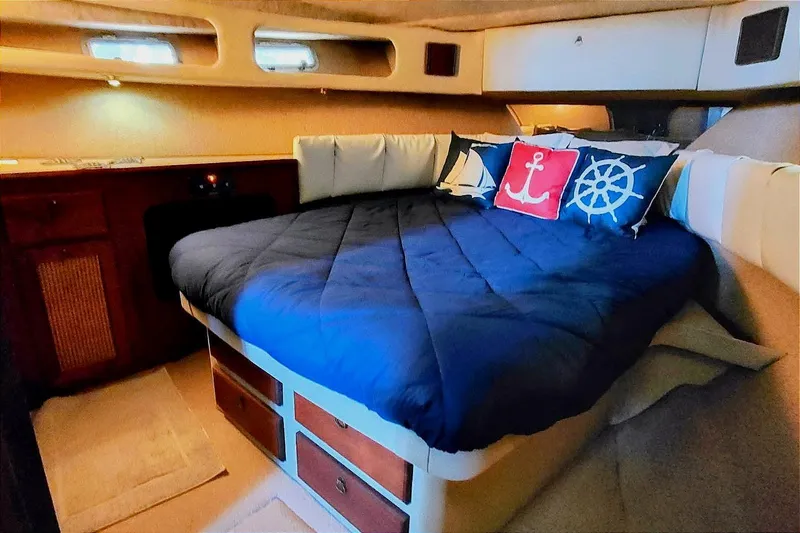 Slide: The Image of Interior of 1986 Bayliner 3870 Motoryacht with cozy bed. - 1