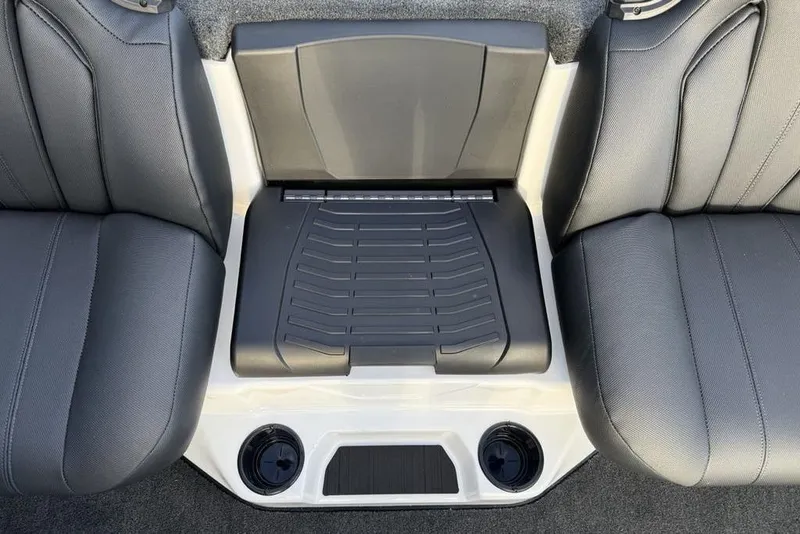 Slide: The Image of 2026 Skeeter ZXR19 SE boat interior with dual seats and center console. - 19