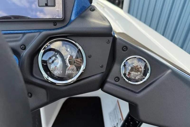 Slide: The Image of Dashboard of 2026 Skeeter ZXR19 SE with volt, fuel, and water pressure gauges. - 20