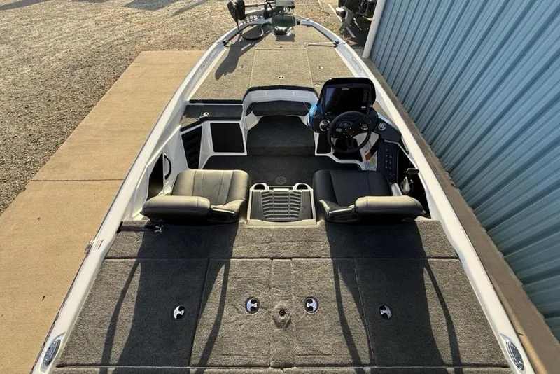 Slide: The Image of 2026 Skeeter ZXR19 SE boat interior with dual seats and steering console. - 27