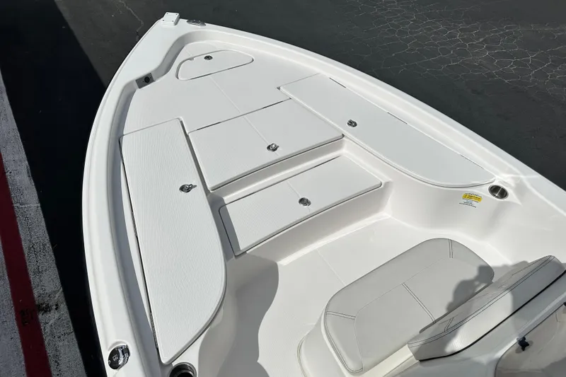 Slide: The Image of 2020 Blue Wave 2000 Classic boat interior with steering console and seating. - 9