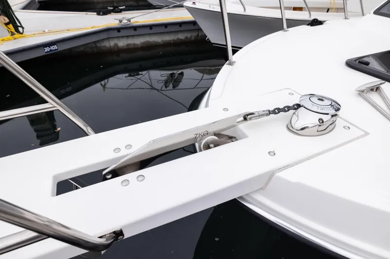 Slide: The Image of 2023 Skipjack 26 Flybridge boat anchor system at dock. - 11