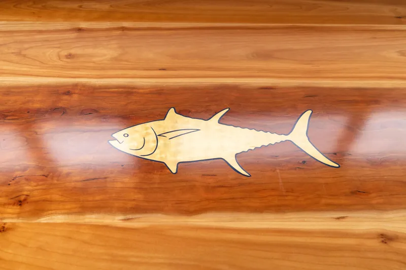 Slide: The Image of Wooden surface with fish inlay design on Skipjack 26 Flybridge, 2023 model. - 36
