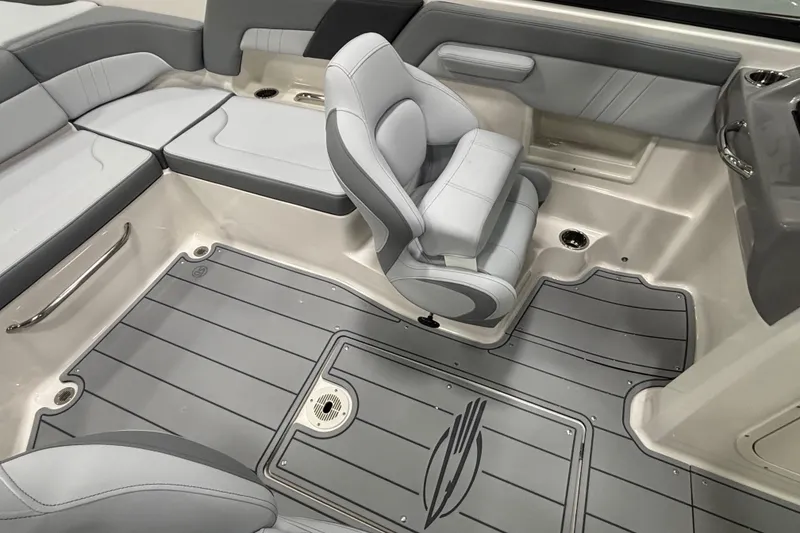 Slide: The Image of Interior of 2026 Chaparral 23 SSi boat, featuring sleek seating and modern design. - 22