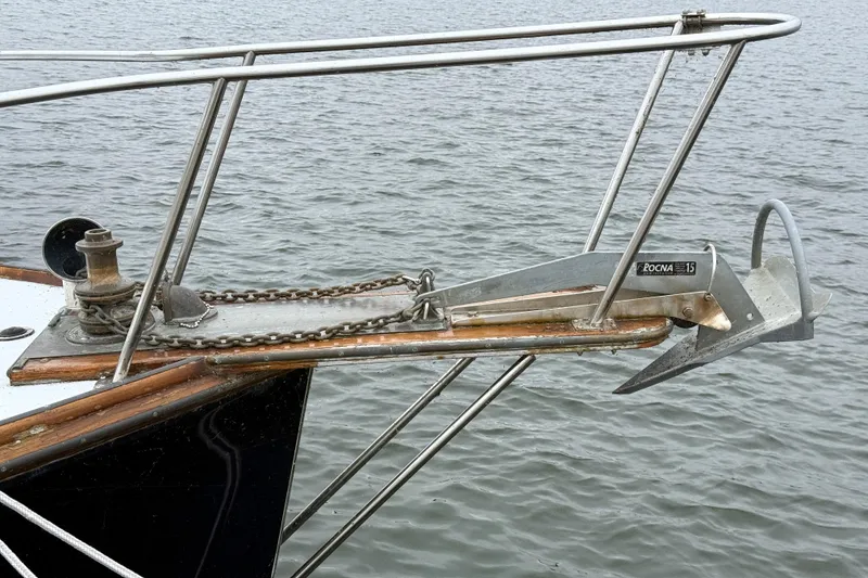 Slide: The Image of Bow of 1983 Wilbur 34 Fly Bridge Cruiser with anchor and chain. - 6