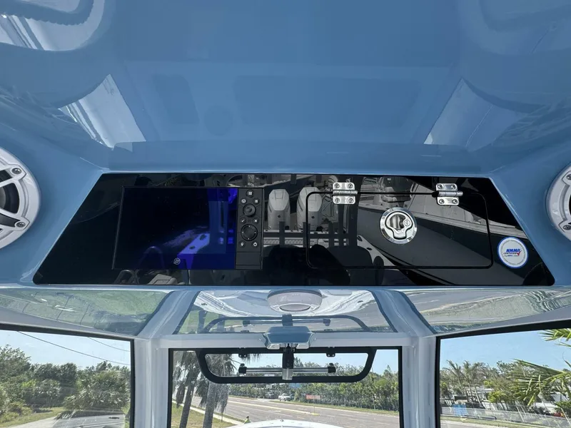 Slide: The Image of 2025 Sportsman 352 Open boat dashboard with modern controls and sleek design. - 20