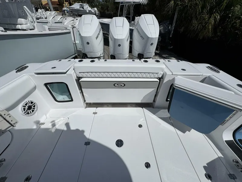 Slide: The Image of 2025 Sportsman 352 Open boat deck with triple Mercury engines. - 7