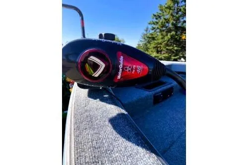 Slide: The Image of 1995 Tracker Pro Deep V-17 boat with a MotorGuide trolling motor, outdoors. - 4