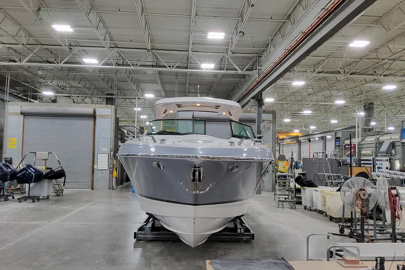 Slide: The Image of 2026 Formula 350 Crossover Bowrider OB in a spacious indoor facility. - 11