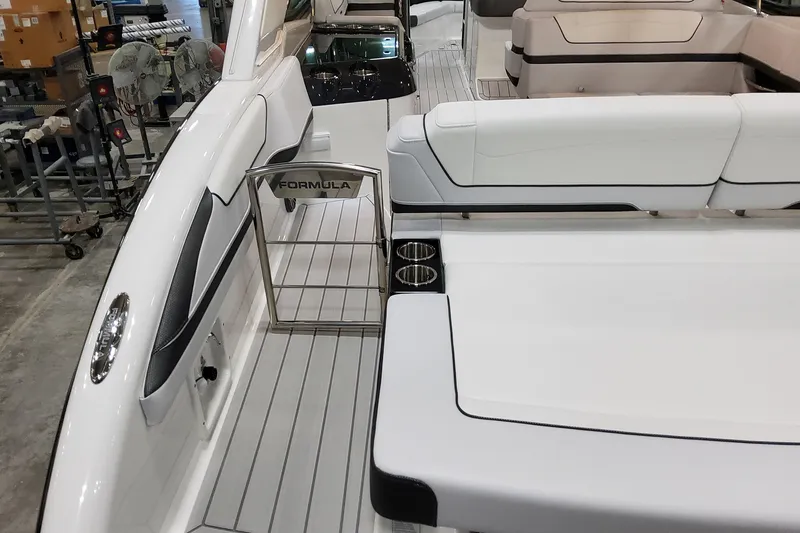 Slide: The Image of 2026 Formula 350 Crossover Bowrider OB interior with sleek seating and modern design. - 16