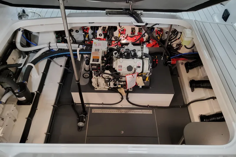 Slide: The Image of Engine compartment of 2026 Formula 350 Crossover Bowrider OB, showcasing detailed mechanical components. - 19