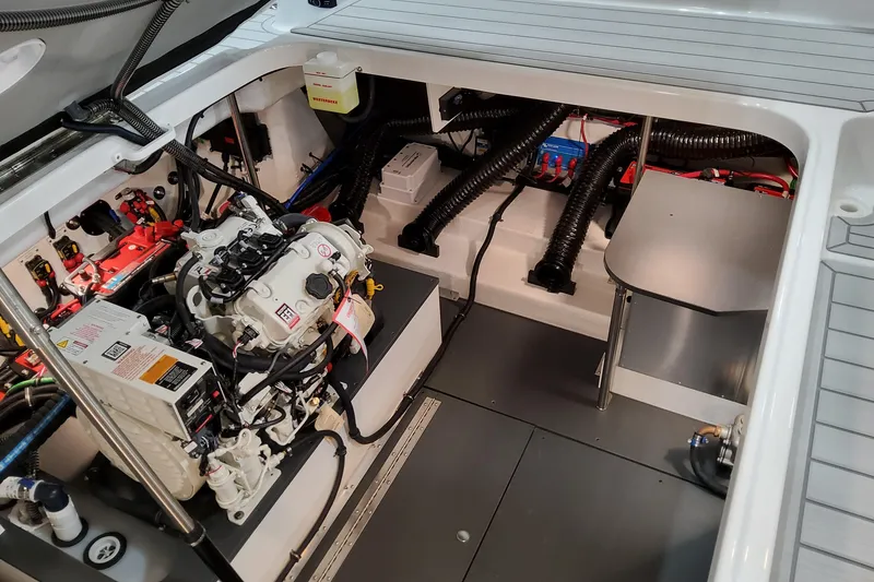 Slide: The Image of Engine compartment of 2026 Formula 350 Crossover Bowrider OB, showcasing detailed mechanical components. - 21