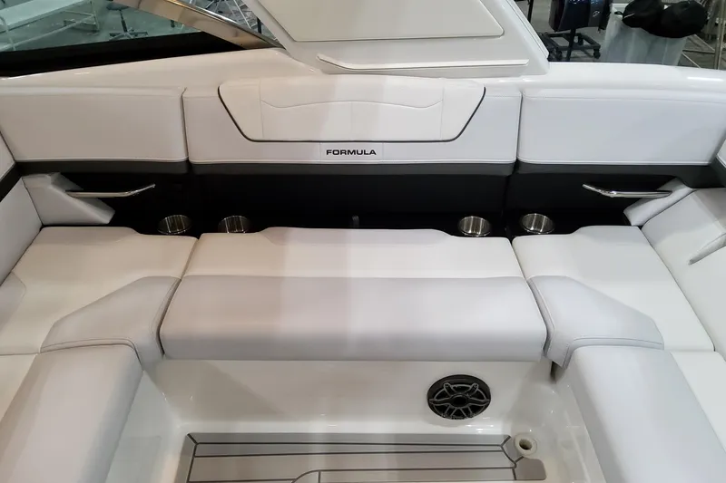 Slide: The Image of 2026 Formula 350 Crossover Bowrider OB interior with white seating and cup holders. - 24