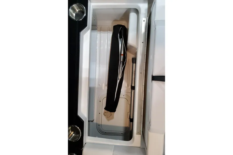 Slide: The Image of Storage compartment in 2026 Formula 350 Crossover Bowrider OB boat. - 25