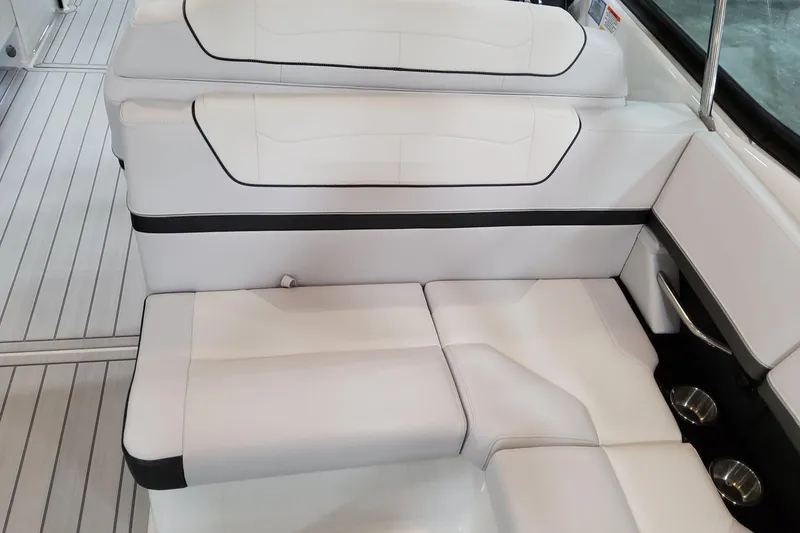 Slide: The Image of 2026 Formula 350 Crossover Bowrider OB interior seating, featuring sleek white upholstery. - 27