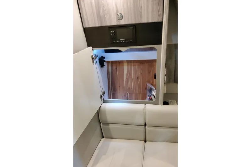 Slide: The Image of Interior of 2026 Formula 350 Crossover Bowrider OB, featuring modern cabinetry and seating. - 66