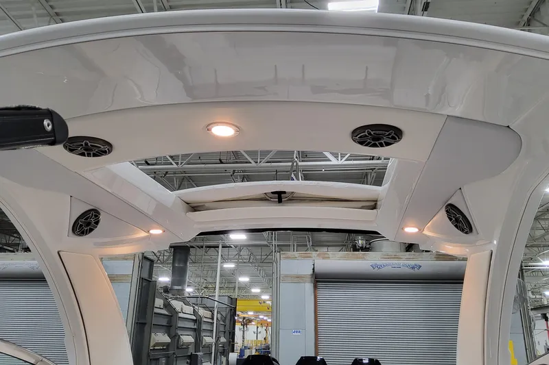 Slide: The Image of 2026 Formula 350 Crossover Bowrider OB interior with speakers and lighting. - 71