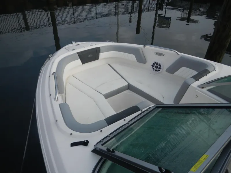 Slide: The Image of 2023 Chaparral 21 SSi OB boat with spacious seating and sleek design. - 15