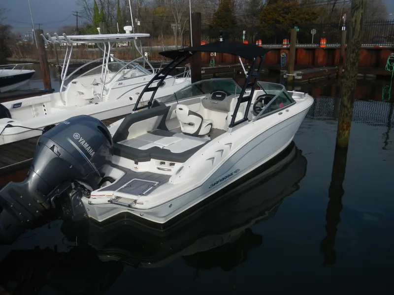 Slide: The Image of 2023 Chaparral 21 SSi OB boat with Yamaha outboard engine docked in marina. - 4