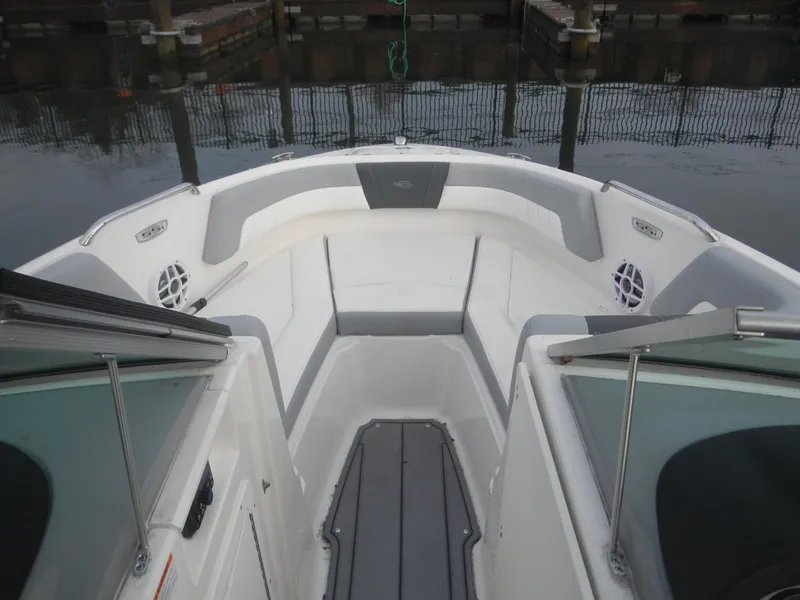 Slide: The Image of 2023 Chaparral 21 SSi OB boat interior with sleek seating and modern design. - 9
