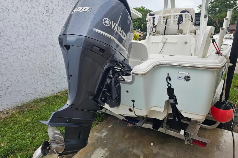 Slide: The Image of 2020 Sea Hunt BX 25 FS boat with Yamaha 300 outboard motor on trailer. - 4