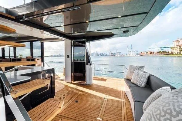 Slide: The Image of Luxurious 2021 OKEAN FB Motor Yacht with spacious deck and waterfront view. - 12