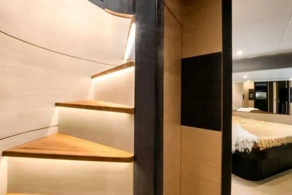 Slide: The Image of Luxurious interior of 2021 OKEAN FB Motor Yacht with elegant staircase and cozy bedroom. - 21