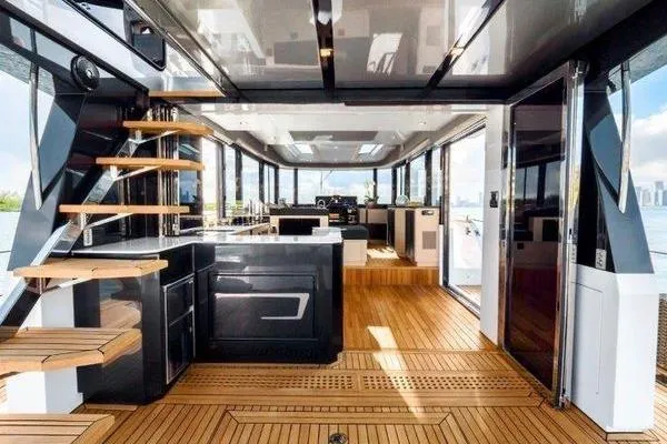 Slide: The Image of Luxurious 2021 OKEAN FB Motor Yacht interior with modern design and wooden flooring. - 3