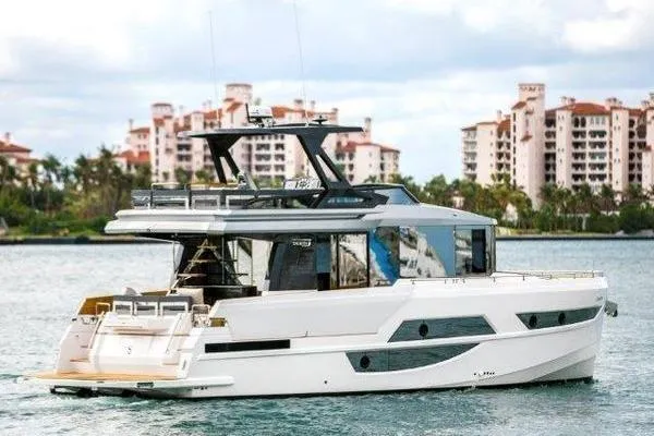 Slide: The Image of 2021 OKEAN FB Motor Yacht cruising near waterfront buildings. - 30
