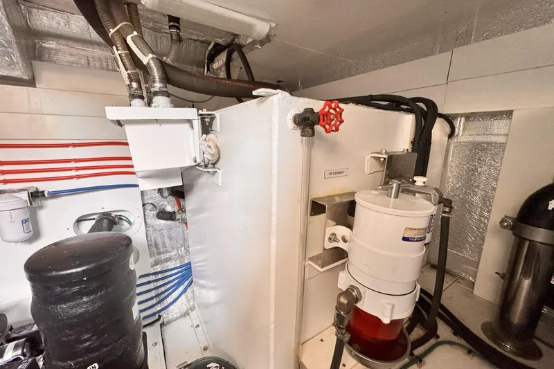 Slide: The Image of Engine room of 2021 OKEAN FB Motor Yacht with visible piping and filtration system. - 33