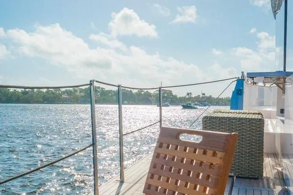 Slide: The Image of Luxurious 2021 OKEAN FB Motor Yacht deck with scenic water view. - 5