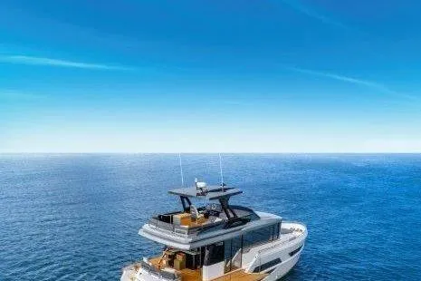 Slide: The Image of 2021 OKEAN FB Motor Yacht cruising on open sea under clear blue sky. - 7