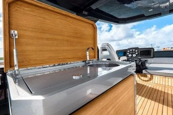 Slide: The Image of Outdoor kitchen on 2021 OKEAN FB Motor Yacht with sink and control panel. - 9